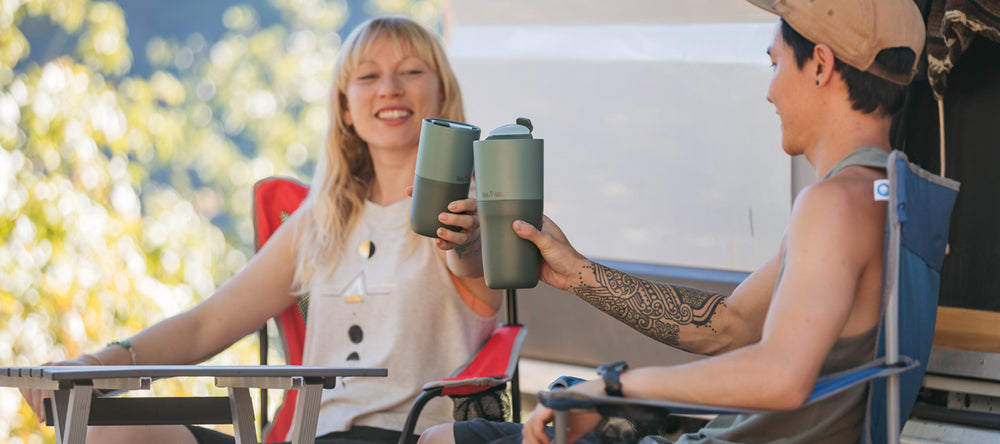 Women with Tumblers in camp chairs