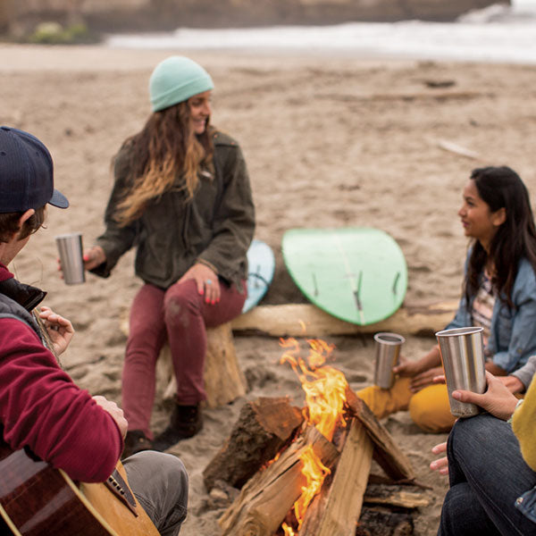 Steel Pint Cups on beach bonfire