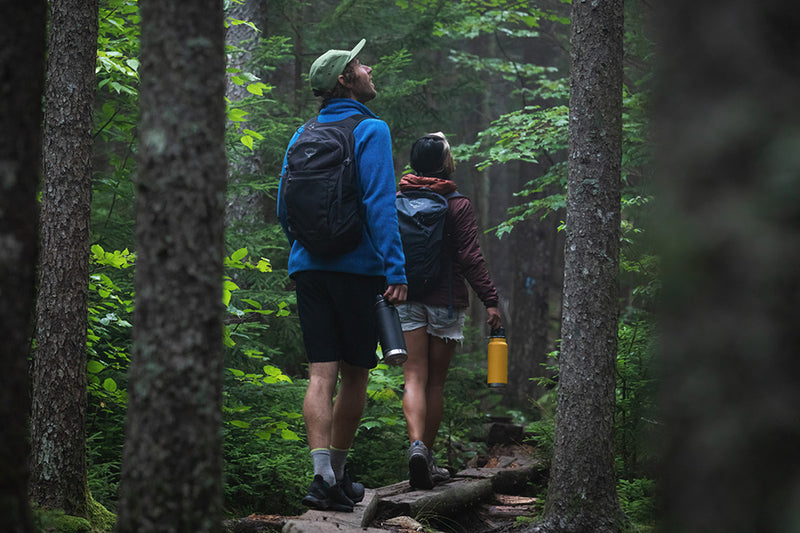 Hiking in Forest with 32oz Bottle