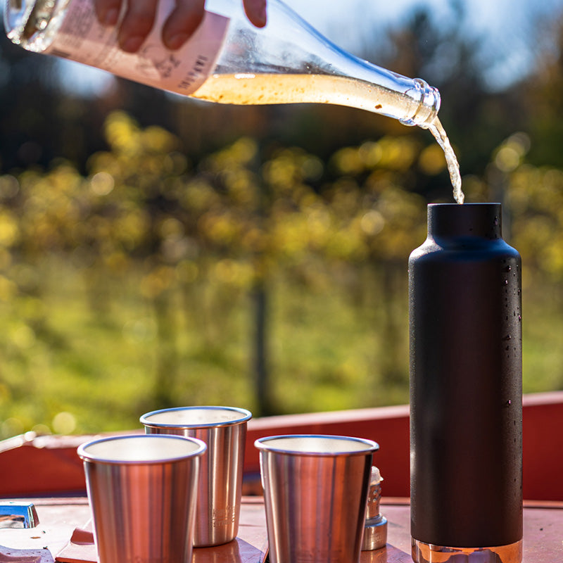 Wine Pouring into Bottle